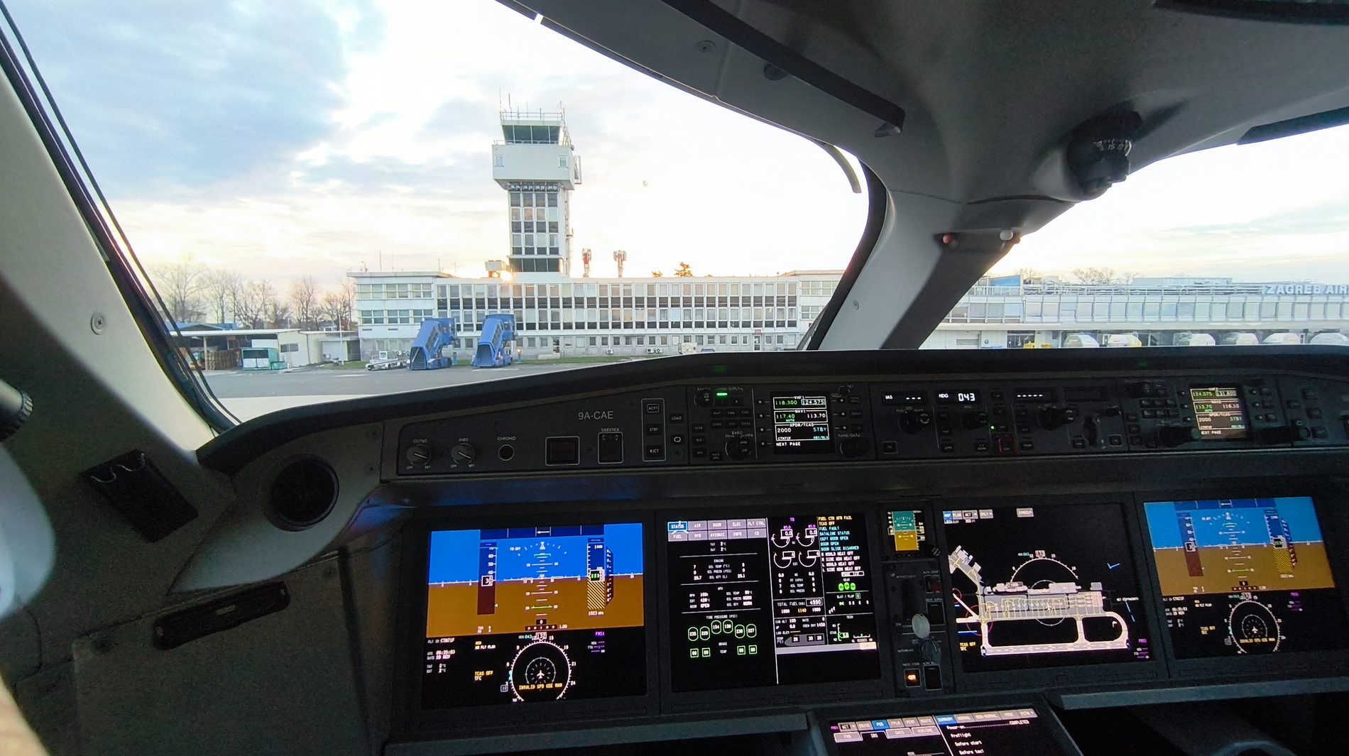 Glass cockpit of an Airbus A220 at Zagreb
